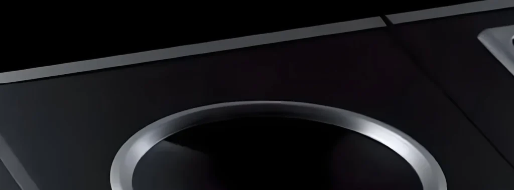 Concave heat resistant glass panel shaped cooktop geometry for OEM specification