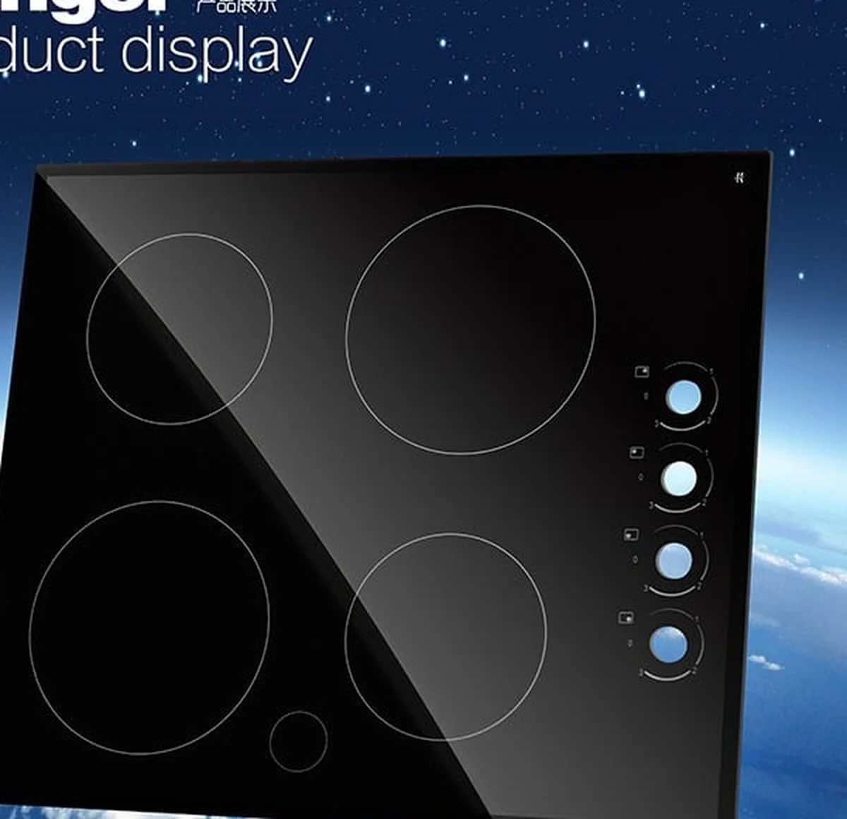 Black induction cooktop panel with control openings and printed markings