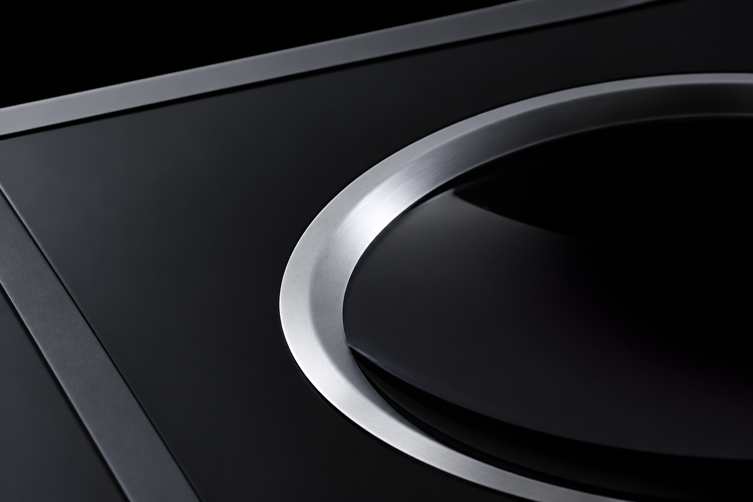 Close review of an arc of the circular feature and silver rim in the custom-shaped glass reference